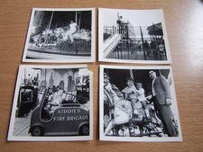 People on Carousel Horses