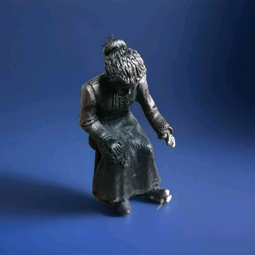 Pewter old lady - lady, sitting