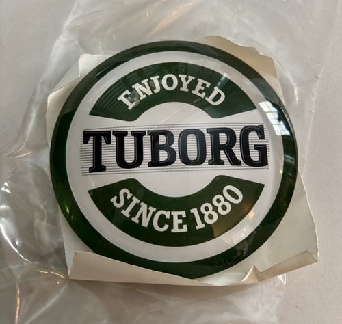 Tuborg lager beer round fish - lager,