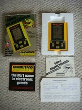 New in Box 1981 Mini Munchman  LCD Pocket Arcade Game Grandstand Leisure .