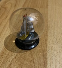 Minature ship in a glass ball