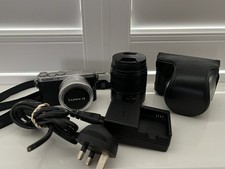 Panasonic LUMIX DMC-GM1 with 12-32mm & 45-150mm Lenses, Case, Strap, Charger