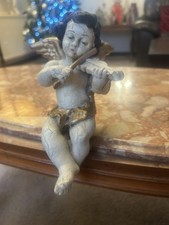 Florence Cherub sitting