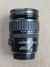 Canon EF 28-135mm F/3.5-5.6 IS USM Lens Front and rear lens caps With Filter