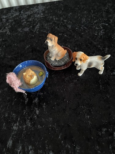Dolls house dogs sitting - house,
