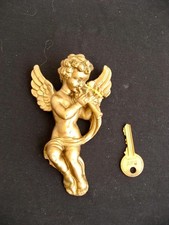 Golden cherub  Putto Hanging