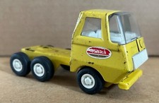vintage Tonka toy lorry cab, 1970s, yellow with labels, black wheels