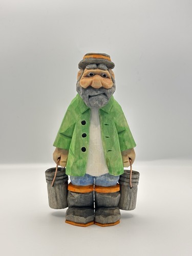 Hand carved wooden milkman - carved,