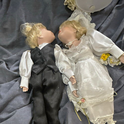 Haunted kissing dolls