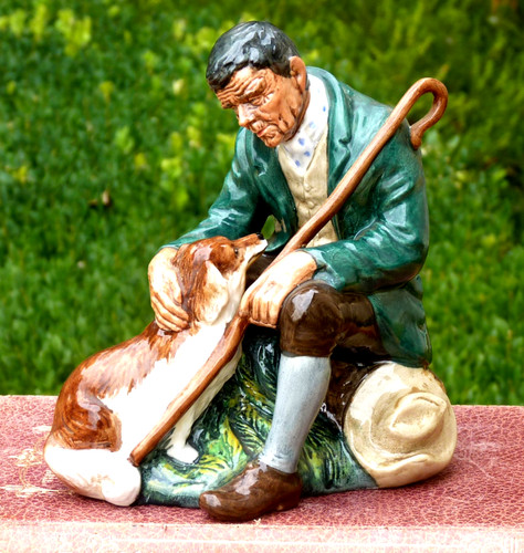 Royal doulton figurine dog and - figurine,