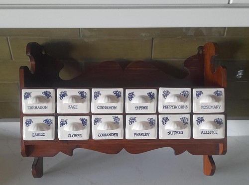 Vintage wooden spice rack with