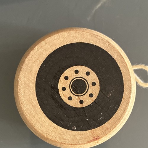 Wooden with string - yo-yo,