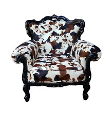 BESPOKE VINTAGE COW HIDE ARM CHAIR
