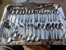 Silver coloured tea spoons. Used condition.  Large collection
