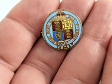 Victorian enamel coin brooch