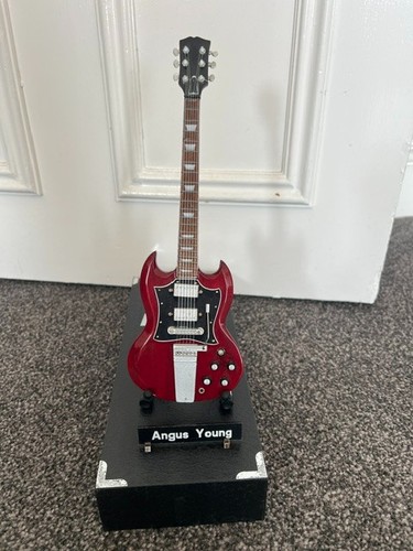 Axman angus young miniature - young,