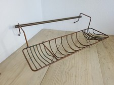 Vintage copper bath rack, bath tidy, sits on side of a roll top bath, bath tray