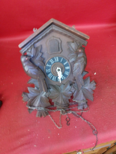 Nice looking old cuckoo clock - looking,