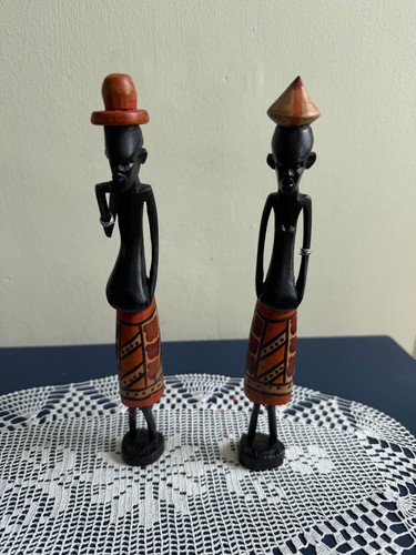 Pair hand carved wooden - of,