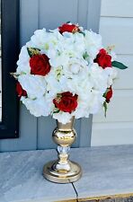 Red, cream and gold artificial arrangement, in golden vase. 