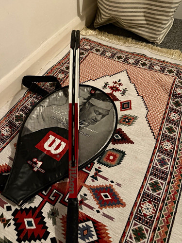 Wilson titanium tennis racket - tennis,