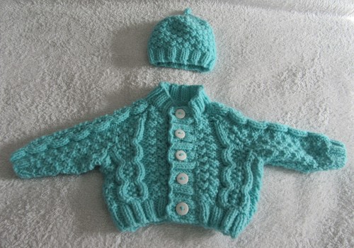 Hand knitted cable patterned