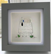 Snoopy dog on kennel. Sea