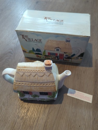 The village teapot collectable - the,