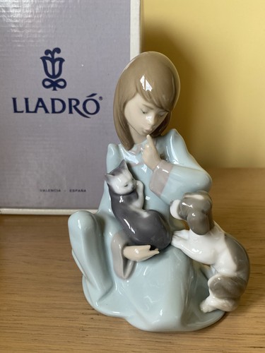 Lladro cat nap girl holding - girl,