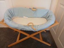 Baby's Moses basket with stand