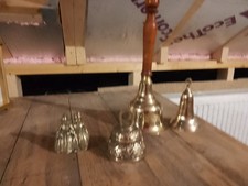 A Collection Of 4 Old Brass Bells Including Hand ,Dutch , Sanctuary. No Ringers