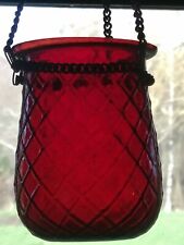 Glass fairy tealight holder.