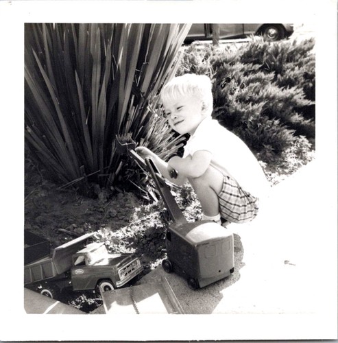 Young boy playing with toy - playing,