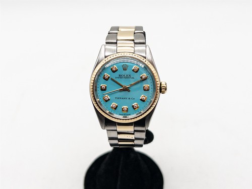 14000 rolex 31mm - $14000,