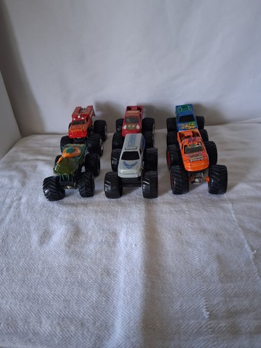 Six monster trucks - six,