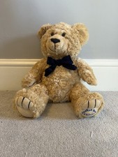 Joshua bear with - bow, cuddly