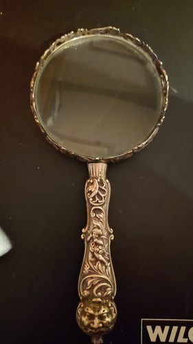 Old silver magnifying glass - old,