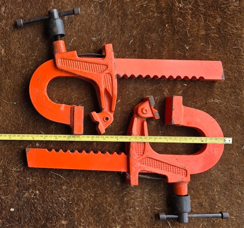 Pair carver rack clamps - of,