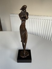 Bronze sculpture of a woman
