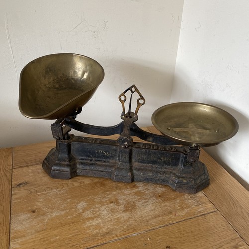 Antique cast iron weighing - cast,