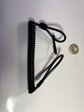 Coiled pistol handgun lanyard 