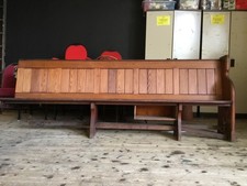 Pitch pine wooden church pew.