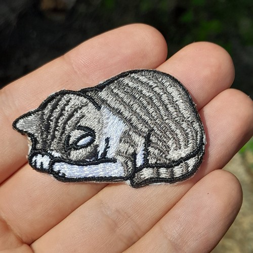 Cat iron sew on - /,