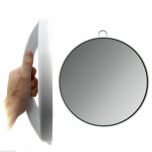 Round hand held mirror - hand,