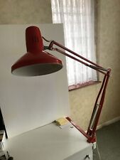 Two Red Swedish designed Angle Poise Lamps.