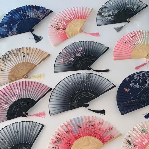 Silk bamboo folding hand - hand, fan