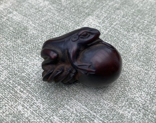 Hand carved teakwood - , netsuke