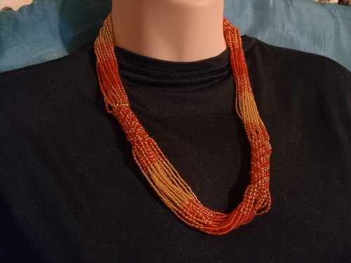 Red gold zulu glass bead - &,