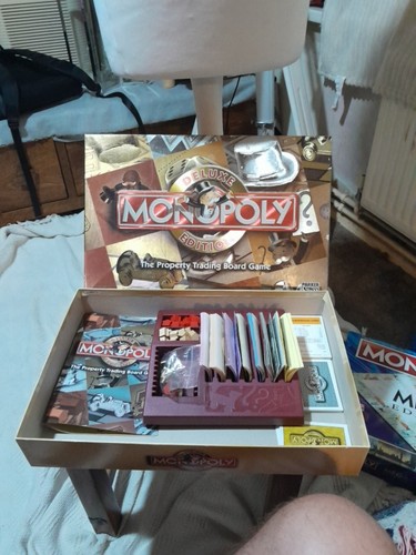 Monopoly board game deluxe - game,