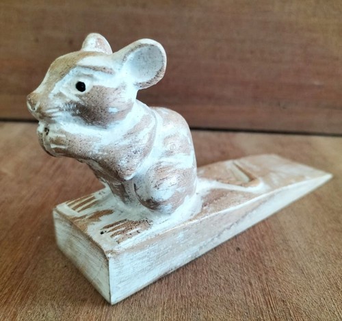 Hand carved doorstop - carved,